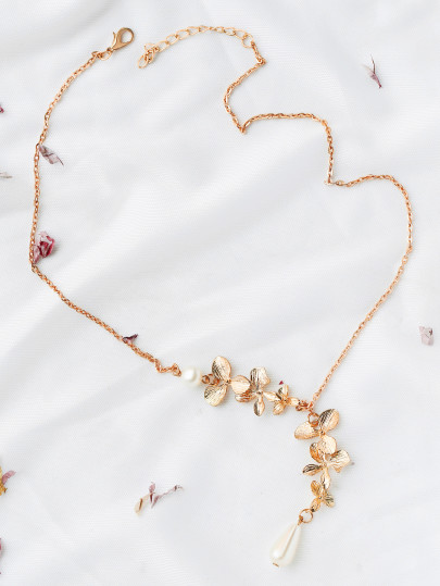 Collier de chaîne en or orné de fleurs