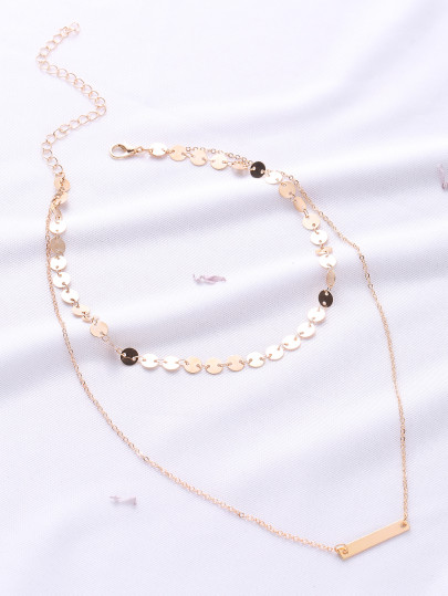 Collier or à étages