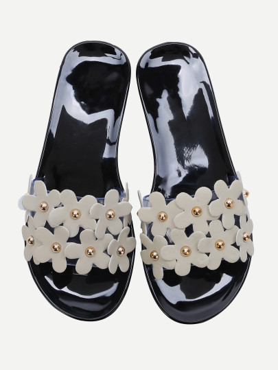 Sandalias planas con adornos de flor - negro