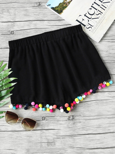 Pantaloncini con bordi a pompon colorato