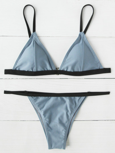 Maillot de bain bicolore triangle découpé