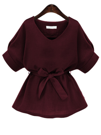 Blouse col en V avec un lacet