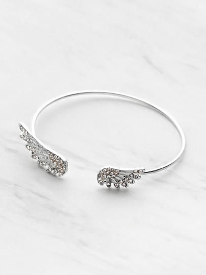 Bracelet en manchette en forme d'aile embellie en strass