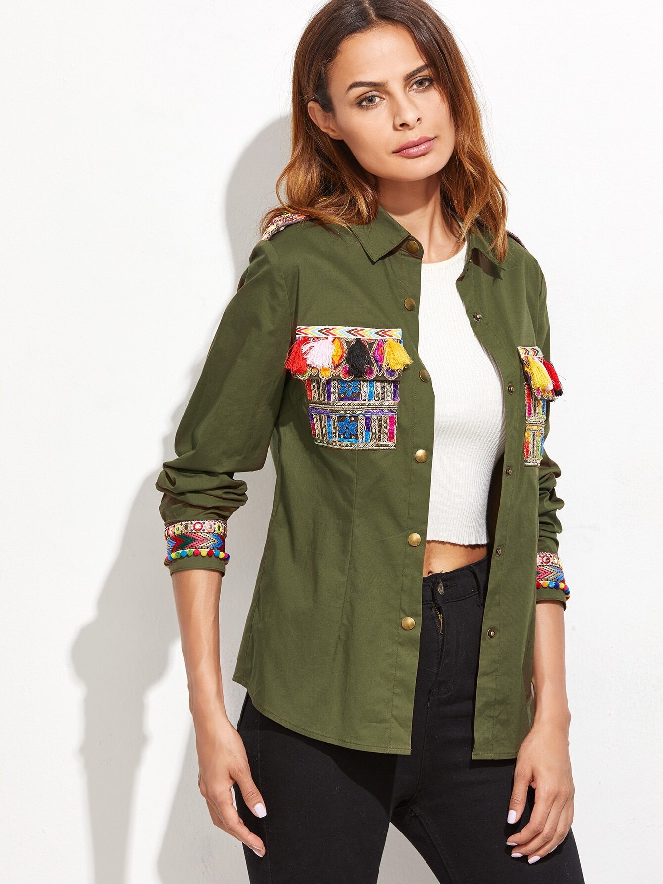 olive green blouse with embroidered tape and tassel detail